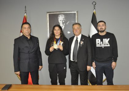 Beşiktaş Chairman Çebi honours club's world champion wrestler Nesrin Baş 